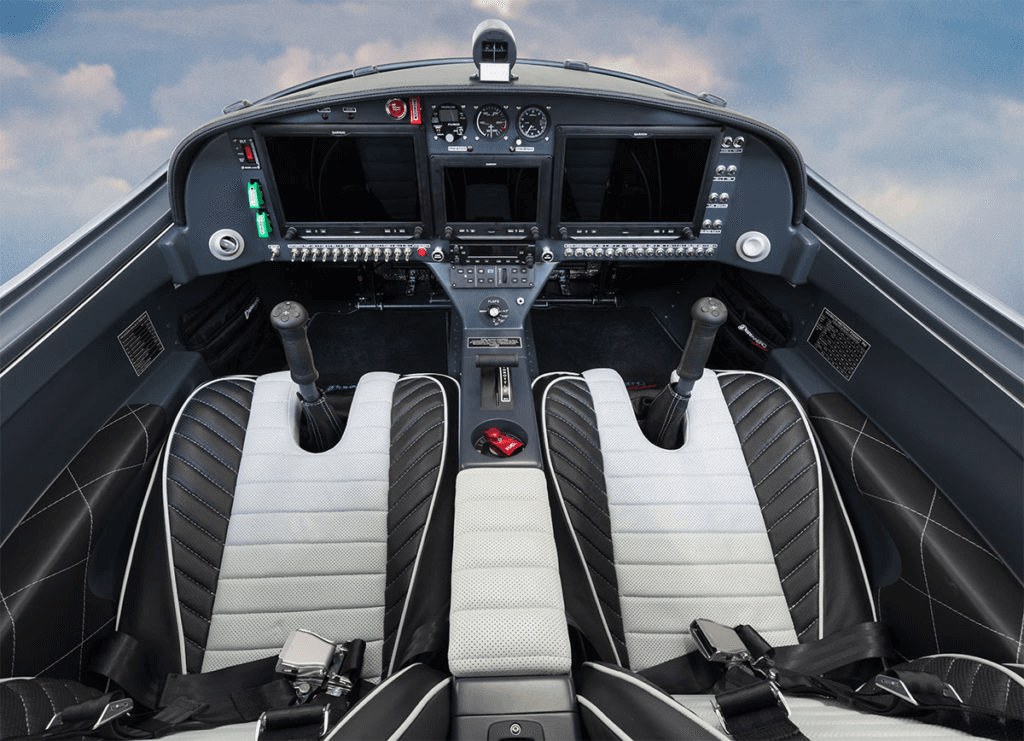 Premium dual-seat glass cockpit interior with Garmin displays and quilted leather seats