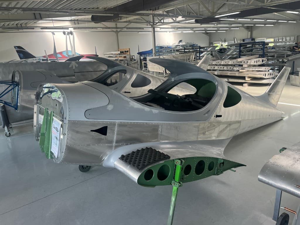 Custom light sport aircraft fuselages under assembly in a manufacturing hangar
