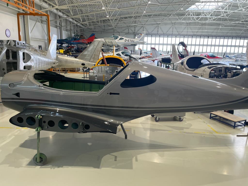 Custom light sport aircraft under assembly in a hangar