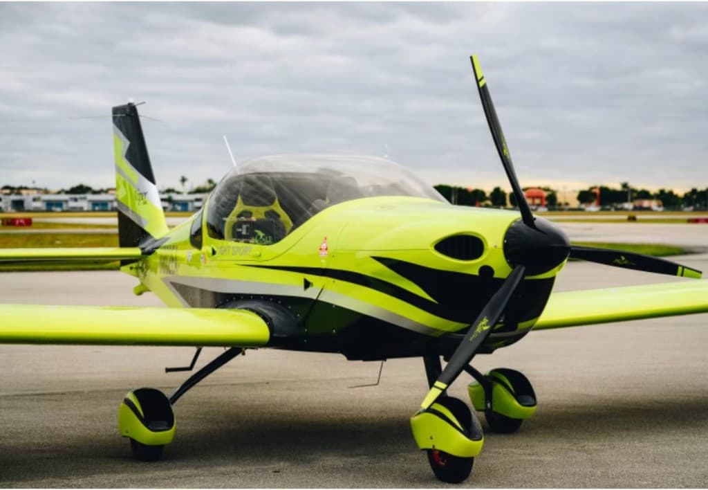 Lime green Viper SD4 training aircraft
